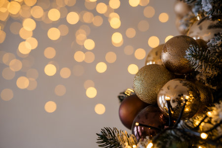 Sparkling Christmas Ornaments with Warm Bokeh Background.の写真素材