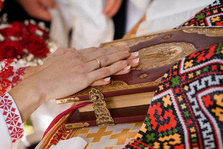 Traditional Ukrainian Wedding Ceremony with a Focus on the Prayer Book.の写真素材