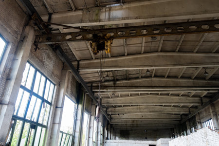 Industrial Decay: The Haunting Beauty of an Abandoned Factory Ceiling.の写真素材