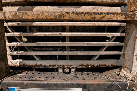 Worn and Weathered Front Grill of an Abandoned Truck.の写真素材