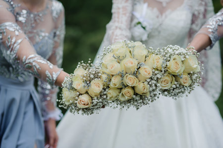 Elegant Bridal Bouquet with Soft Yellow Roses and Delicate Accents.の写真素材