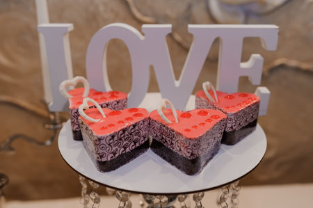 Deliciously Heartfelt Desserts Displayed Elegantly with a Love Theme.の写真素材