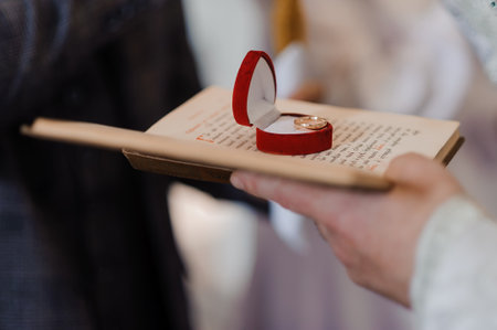 Elegant Wedding Proposal with Ring and Open Book.の写真素材