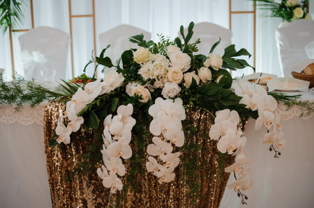 Elegant Floral Arrangement on a Wedding Table.の写真素材