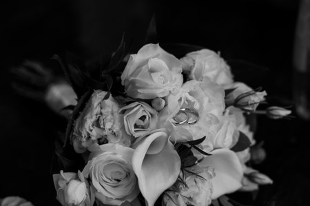 Elegant Black and White Wedding Bouquet with Rings.の写真素材