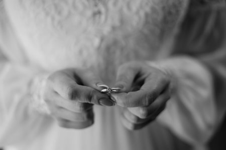 Elegant Wedding Ring Ceremony in Black and White.の写真素材