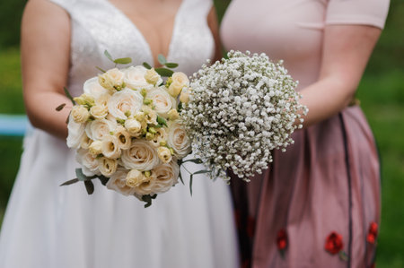Elegant Wedding Bouquet Showcase Featuring Roses and Baby's Breath.の写真素材