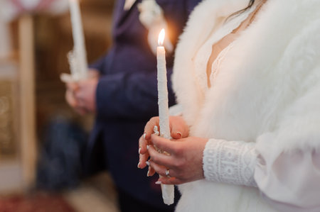 Elegant Candlelight Ceremony of a Bride and Groom.の写真素材