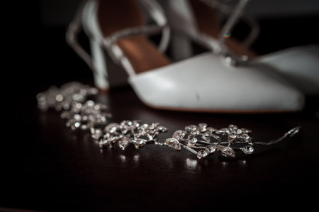 Elegant Bridal Accessories Featuring Sparkling Jewelry and Classic White Shoes.