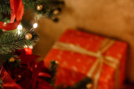 Christmas Tree Decorations with Blurred Gift Box in Background.の写真素材