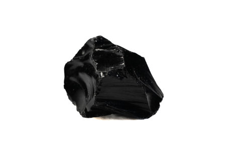Captivating Natural Obsidian Gemstone with Glossy Surface and Sharp Edges.の写真素材