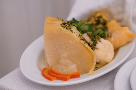 Deliciously Prepared Savory Dish Garnished with Herbs and Carrots.の写真素材