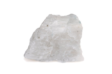 Isolated Raw Natural Moonstone Crystal Specimen with Soft White Translucent Appearance on Plain White Background.の写真素材