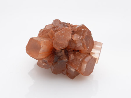 This close-up showcases a beautiful, warm brown aragonite crystal cluster, ideal for mineral enthusiasts, geological study, or alternative healing practicesの写真素材