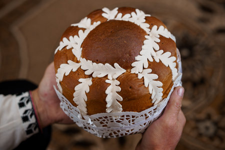 A close-up image showcasing a beautifully decorated Paska bread, an iconic Ukrainian Easter symbol,...