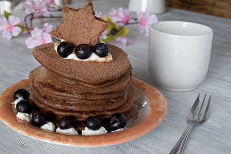 Stack of Delicious Chocolate Pancakes with Blueberries jn tableの写真素材