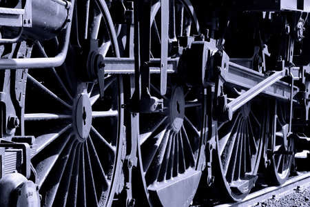 The old iron railway locomotive wheels.
