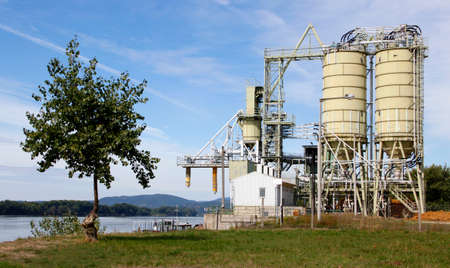 Industrial Estate lonely tree in the river のeditorial素材