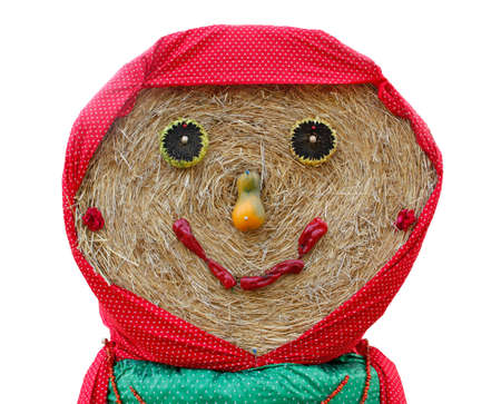 festive handmade straw puppet face.の写真素材