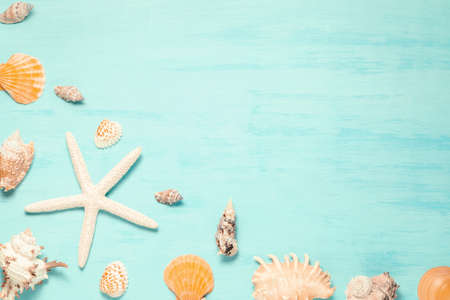 Blue sea background with copy space and seashell border, summer holiday and vacation concept