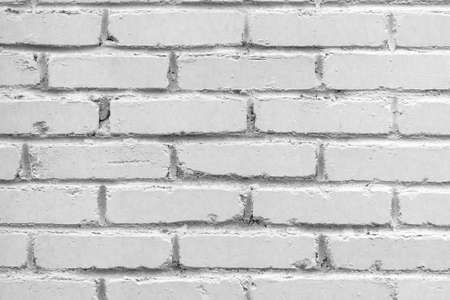 Old brick wall background. Grunge texture. Light surface
