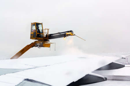 Moscow, Russia - December 11, 2018: process of de-icing the aircraft before the flying in the winterのeditorial素材