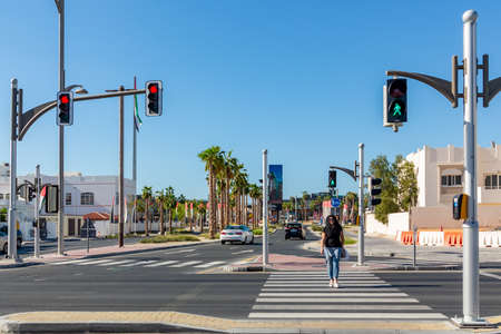 Dubai, United Arab Emirates - December 12, 2018: intersection with traffic lights on a city streetのeditorial素材