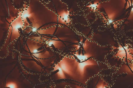 New Year or Christmas background of lights on red