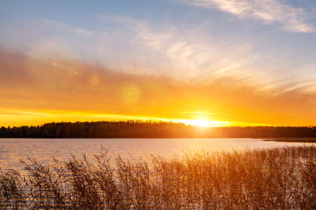 Beautiful sunset on the lake in the autumn evening - Imageの写真素材