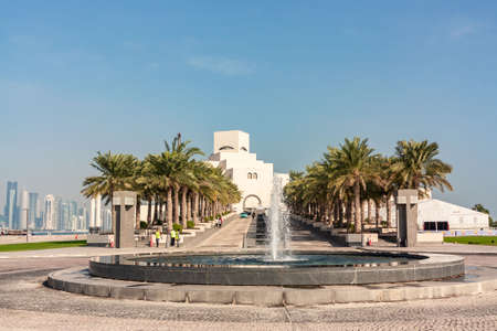 Doha, Qatar - December 20, 2018: fountain and palm tree alley in front of the Museum of Islamic.のeditorial素材