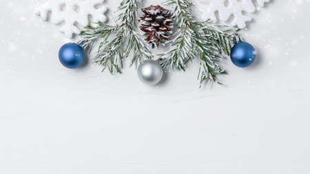 Bright Christmas composition, blank for design - snowflakes, Christmas tree branches and cones, copy space, place for text, flatlayの写真素材