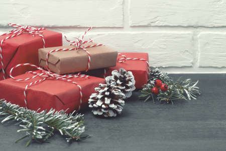Christmas composition, gifts and decorations on a tableの写真素材