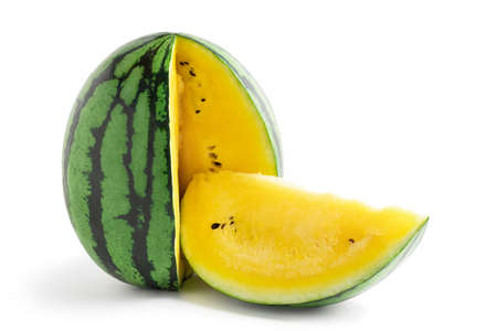 Sliced yellow watermelon isolated on a white background. Saved paths for cutting with and without shadow.の写真素材