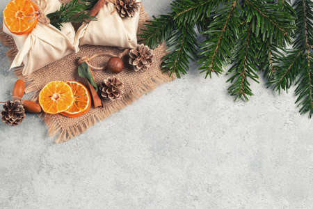 Zero waste christmas concept. Packed in natural fabric gifts and decorations from natural materials...