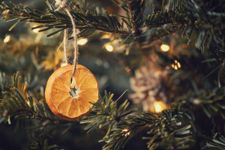 Zero waste christmas concept. Christmas tree decorated with ornaments made of natural materials -...