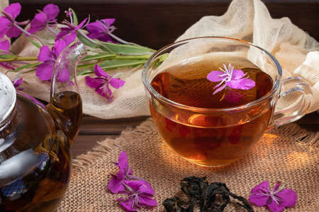 Herbal tea made from fireweed known as blooming sally in teapot and cupの写真素材
