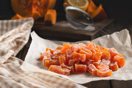 Cooking Natural farm homemade candied pumpkin fruits sprinkled with powdered sugarの写真素材