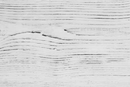 Old wooden board painted with white paint, background, textureの写真素材