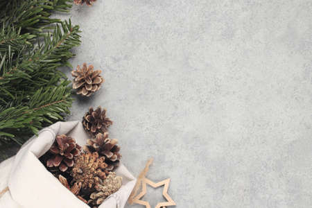 Zero waste and eco friendly christmas concept. Natural decorations and branches of a Christmas tree on the table, top view, flatlayの写真素材