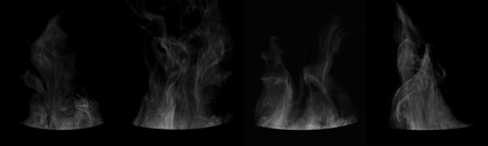 Set of steam from round dishes - pots, mugs or cups isolated on black backgroundの写真素材