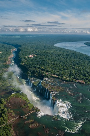 Iguazu falls in Argentina with cloudsの写真素材