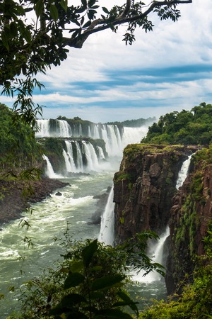 Iguazu falls in Argentina with cloudsの写真素材