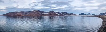 Glacier and mountain range reflections, Svalbardの写真素材