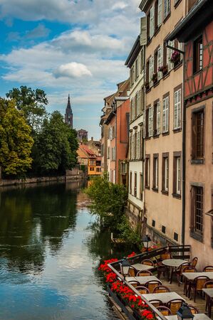 Typical bar terrace near a channel in Strasbourg, Franceの写真素材