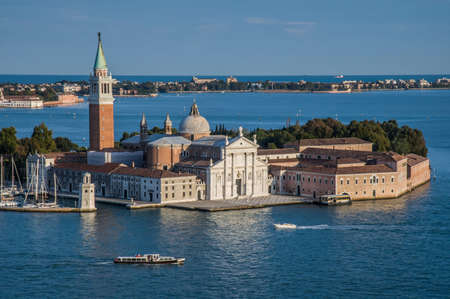 San Giorgio Maggiore in Venice from top of San Marcos, Italyの写真素材