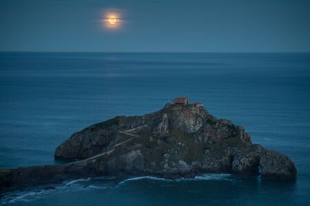 Gaztelugatxe hermitage under the light of the moon at night, Euskadiの写真素材