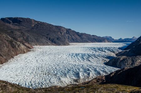 Glacier in a sunny day near Narsarsuaq, Greenlandの写真素材