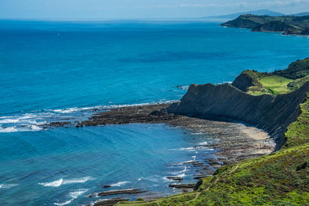 layers of flysch in low tide in Zumaia, Basque Countryの写真素材