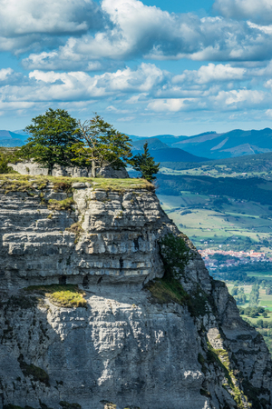 Trees over the cliff in Orduna, Spainの写真素材
