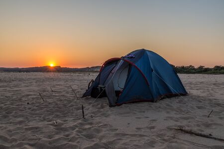 Campsite tent in river Manambolo sand, Madagascarの写真素材